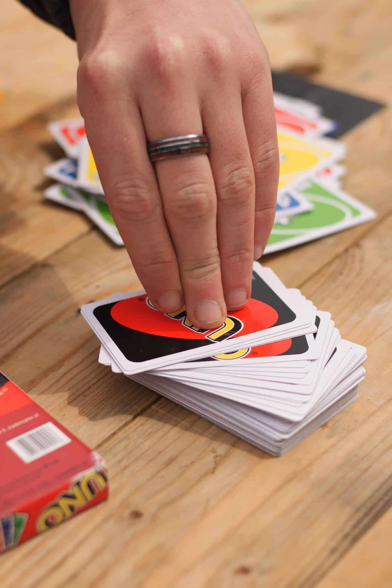 what-does-the-shuffle-hands-card-mean-in-uno-geekextreme